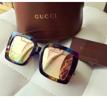 Солнцезащитные очки Gucci